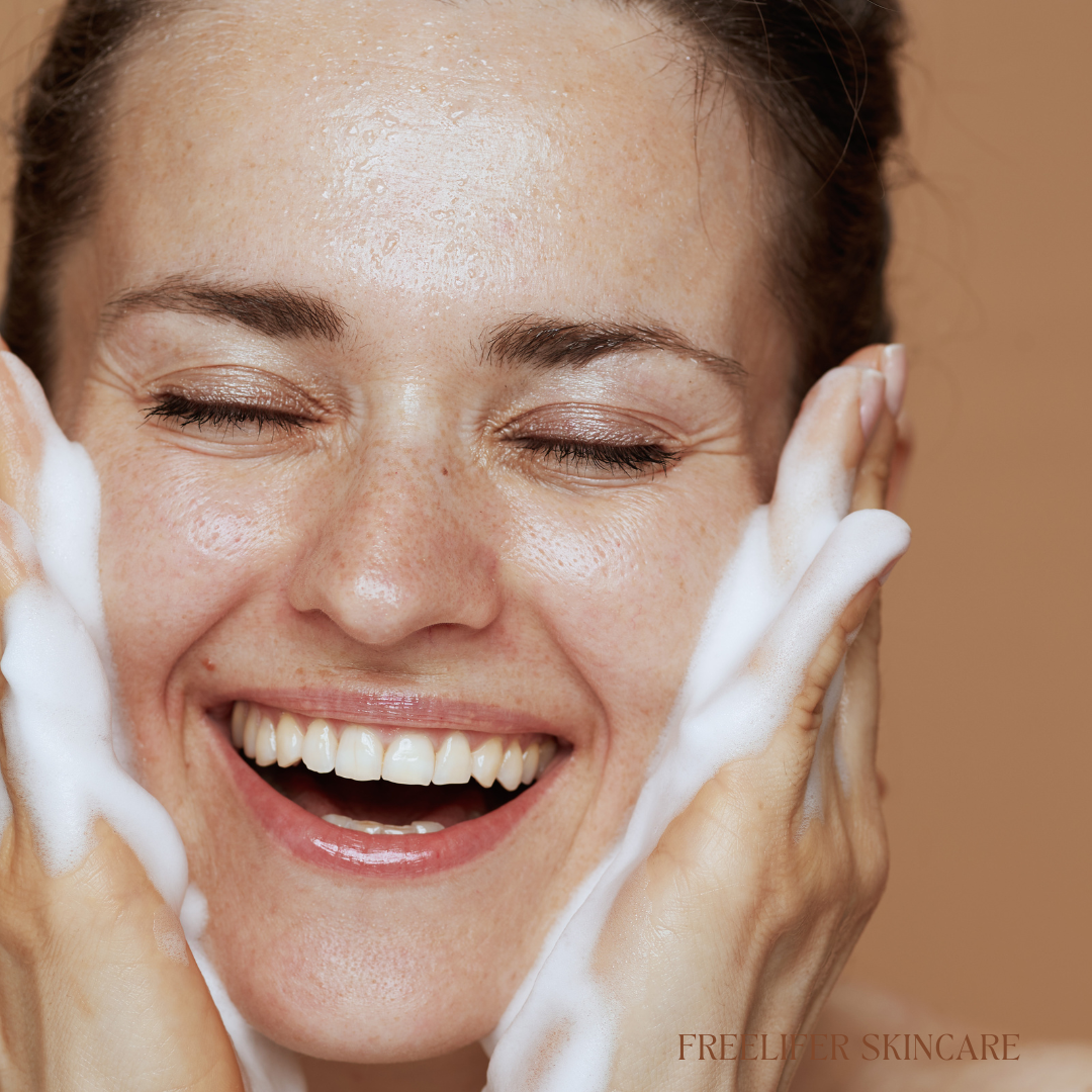 "User applying Freelifer Skincare cleanser to their face
